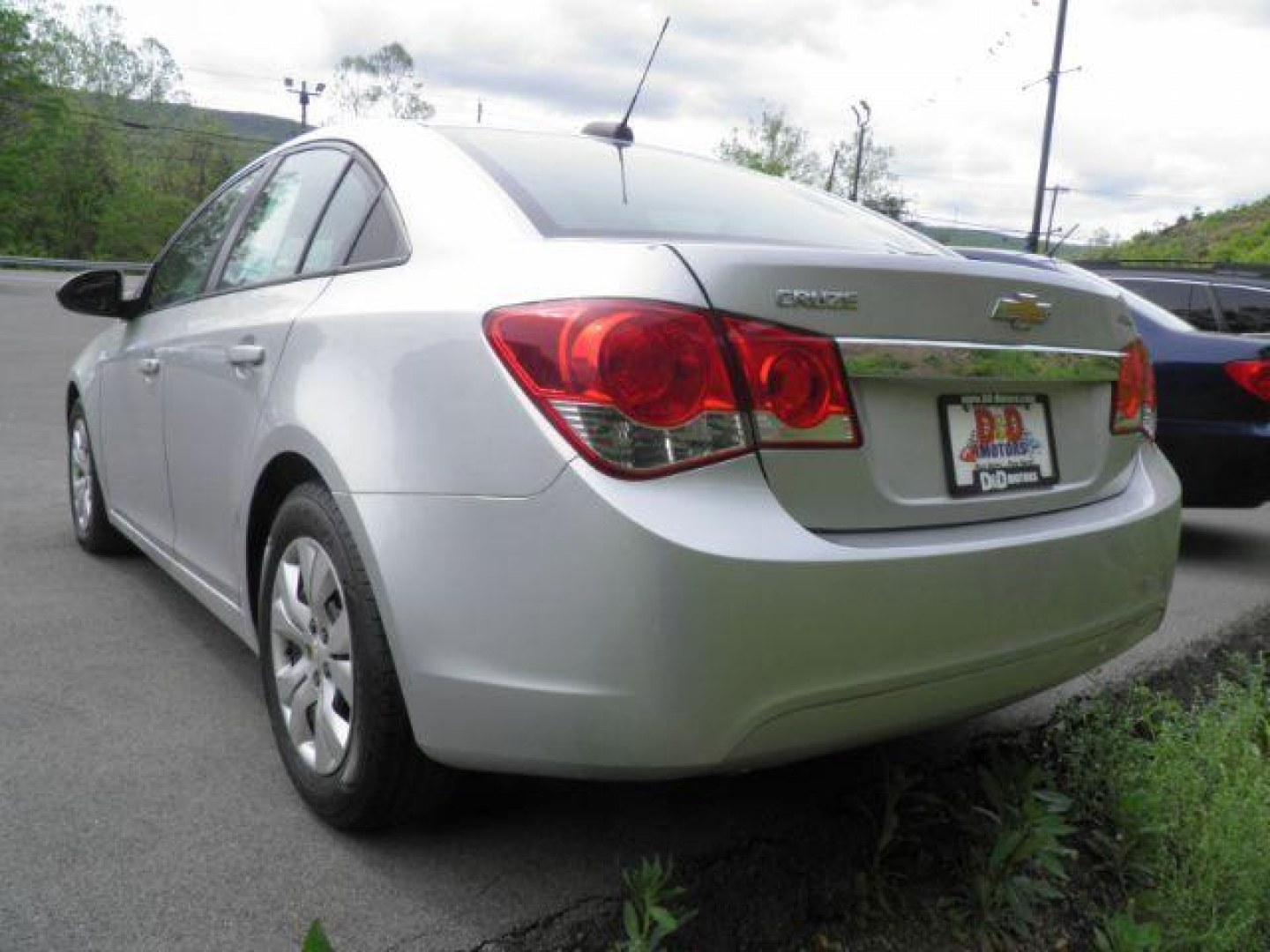 2015 Silver Chevrolet Cruze LS Auto (1G1PA5SG7F7) with an 1.8L I4 engine, AT transmission, located at 15520 McMullen Hwy SW, Belair, MD, 21502, (301) 729-3700, 39.581375, -78.846451 - Photo#4