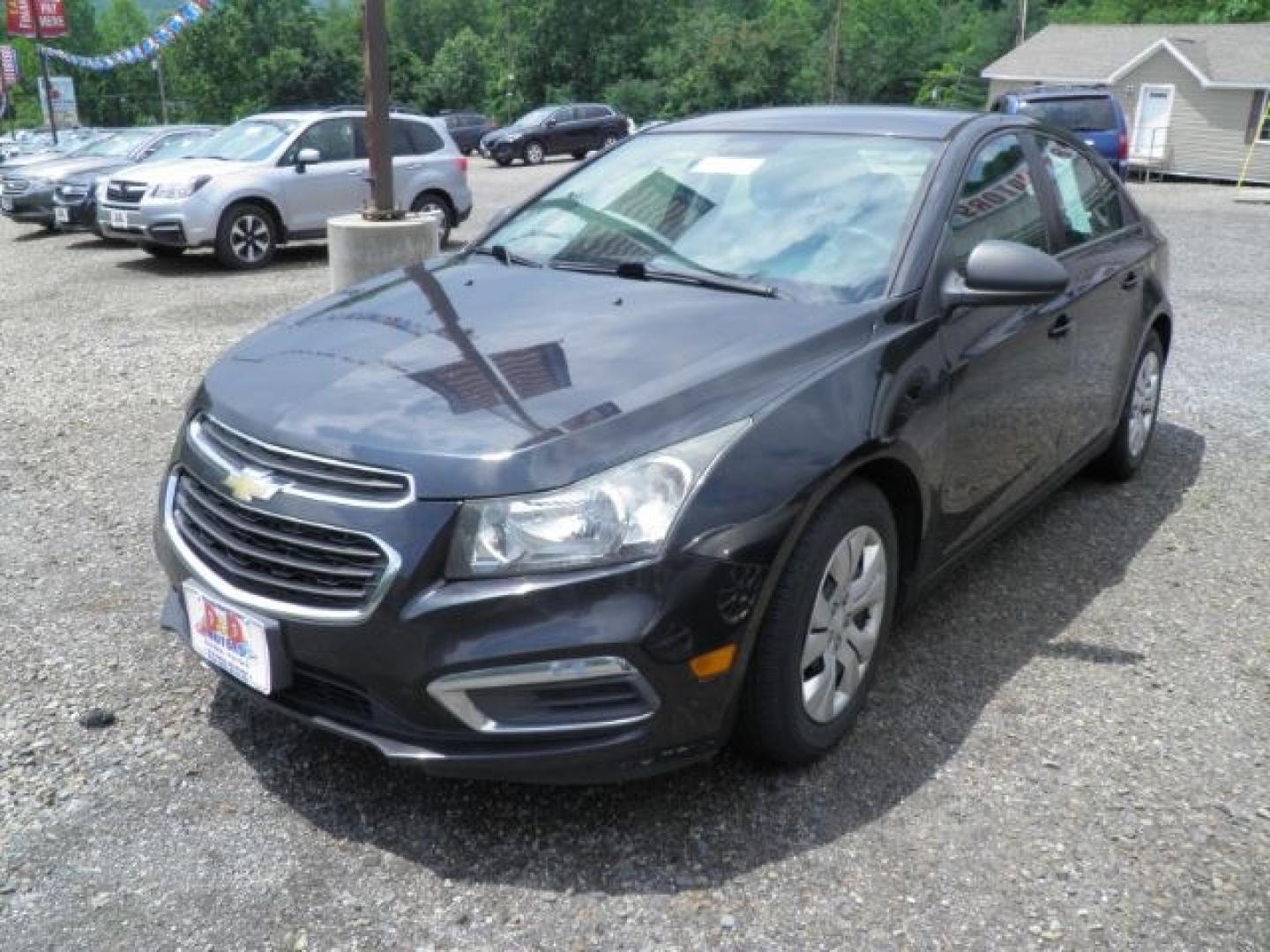 2015 BLACK Chevrolet Cruze LS Auto (1G1PA5SG6F7) with an 1.8L L4 engine, AT transmission, located at 19521 New George's Creek Rd SW, Barton, MD, 21521, (301) 463-2404, 39.524323, -79.017906- Photo#0
