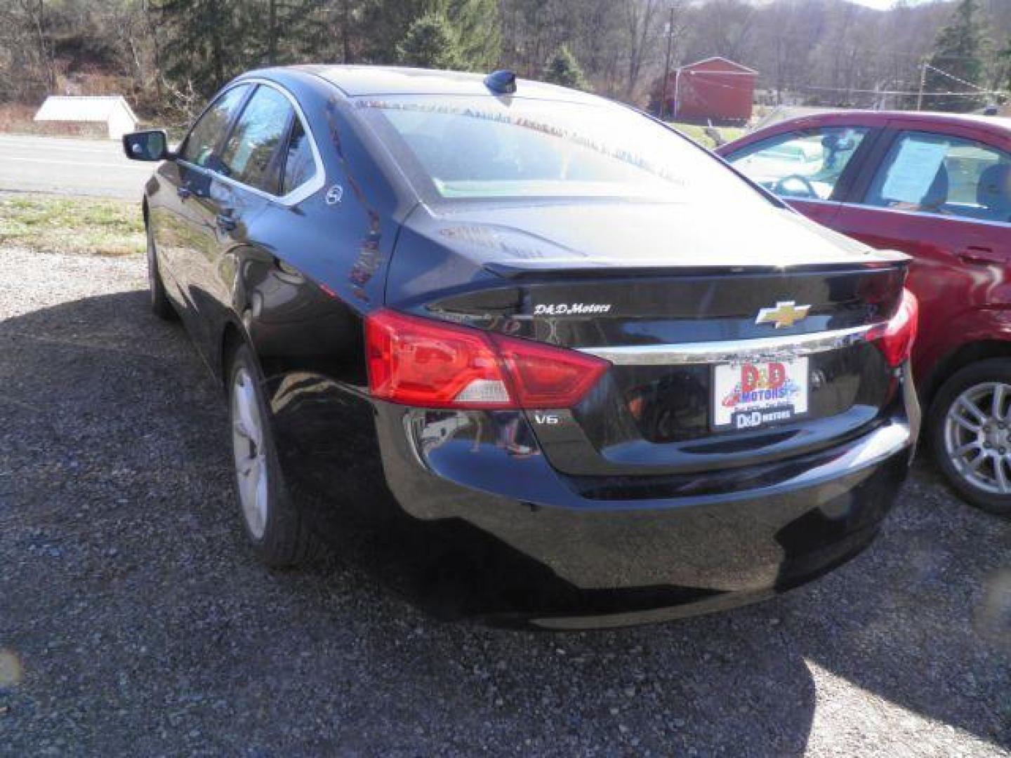2015 Black Chevrolet Impala 2LT (2G1125S35F9) with an 3.6L V6 engine, AT transmission, located at 19521 New George's Creek Rd SW, Barton, MD, 21521, (301) 463-2404, 39.524323, -79.017906 - Photo#4