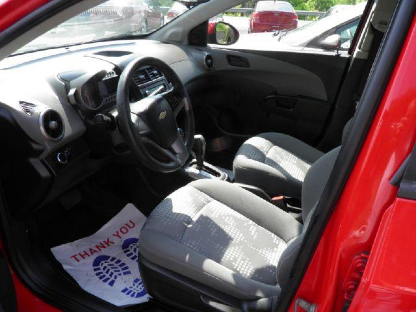 2015 Red Chevrolet Sonic LS Auto 5-Door (1G1JA6SG8F4) with an 1.8L I4 engine, AT transmission, located at 19521 New George's Creek Rd SW, Barton, MD, 21521, (301) 463-2404, 39.524323, -79.017906 - Photo#1