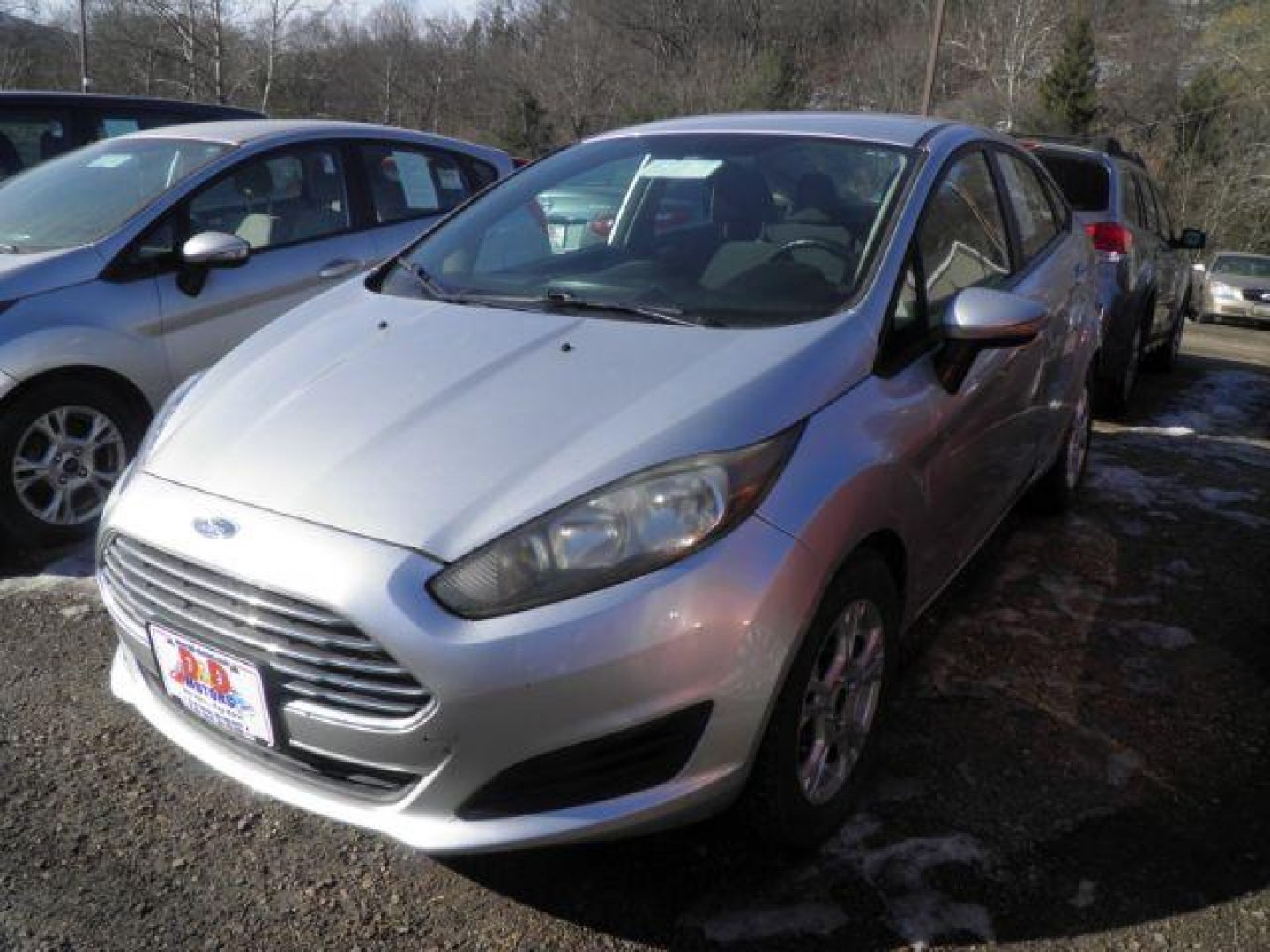 2015 Silver Ford Fiesta SE Sedan (3FADP4BJ6FM) with an 1.6L I4 engine, AT transmission, located at 19521 New George's Creek Rd SW, Barton, MD, 21521, (301) 463-2404, 39.524323, -79.017906 - Photo#0