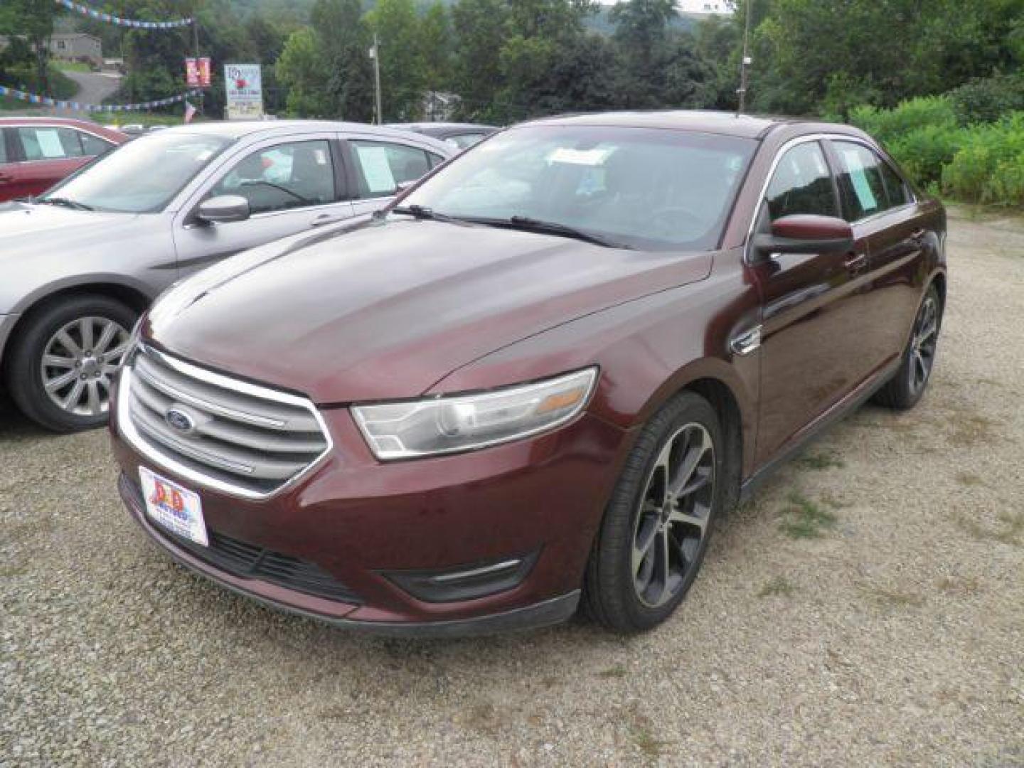 2015 BROWN Ford Taurus SEL FWD (1FAHP2E86FG) with an 3.5L V6 engine, AT transmission, located at 19521 New George's Creek Rd SW, Barton, MD, 21521, (301) 463-2404, 39.524323, -79.017906 - Photo#0