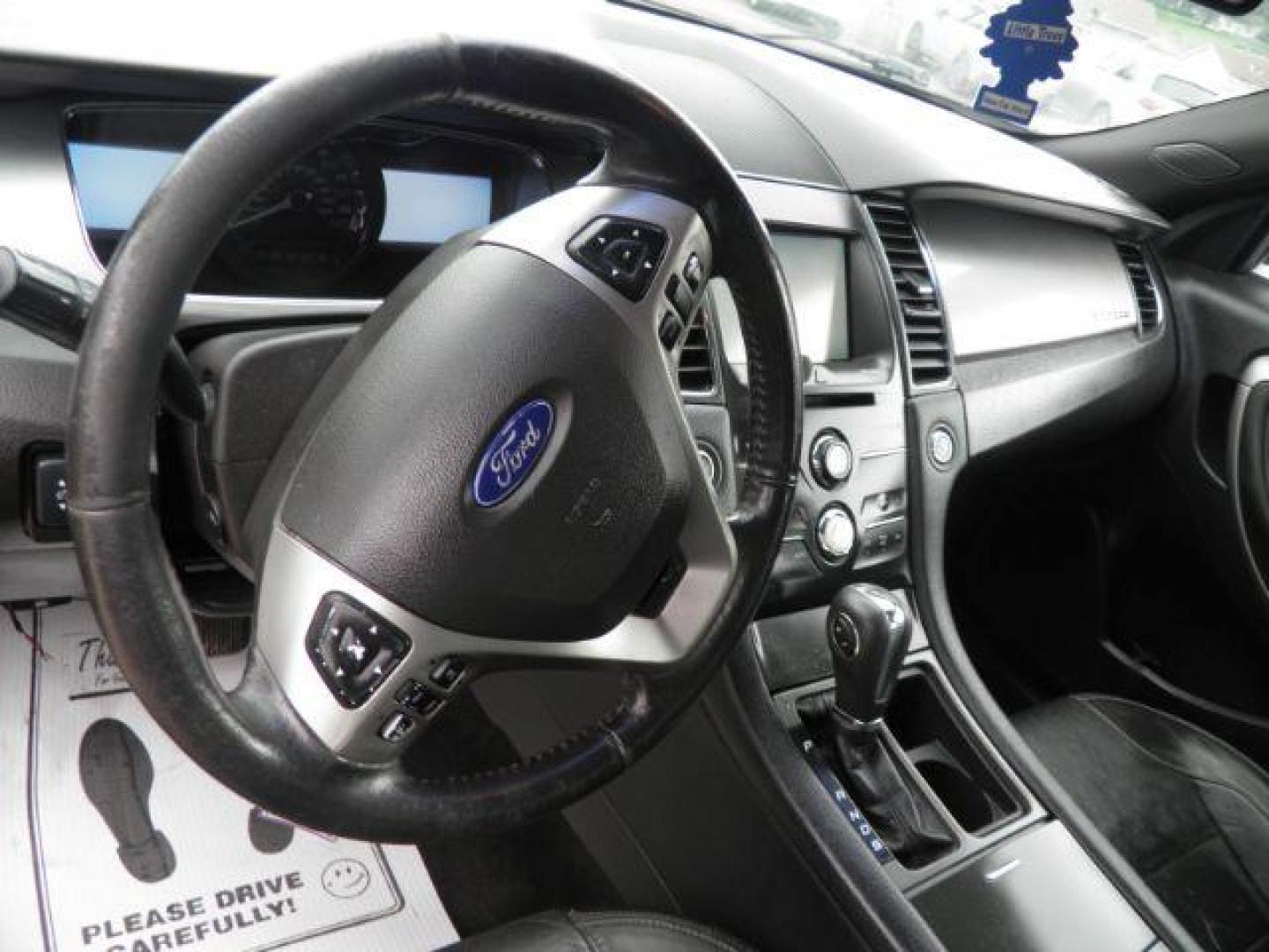 2015 BROWN Ford Taurus SEL FWD (1FAHP2E86FG) with an 3.5L V6 engine, AT transmission, located at 19521 New George's Creek Rd SW, Barton, MD, 21521, (301) 463-2404, 39.524323, -79.017906 - Photo#2