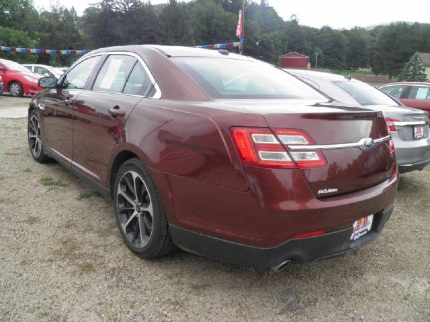 2015 BROWN Ford Taurus SEL FWD (1FAHP2E86FG) with an 3.5L V6 engine, AT transmission, located at 19521 New George's Creek Rd SW, Barton, MD, 21521, (301) 463-2404, 39.524323, -79.017906 - Photo#4
