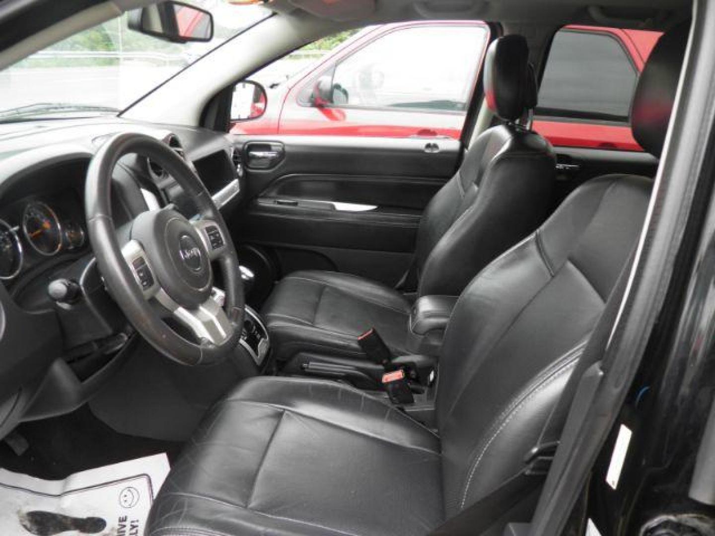 2015 Black Jeep Compass High Altitude Edition (1C4NJDEB1FD) with an 2.4L I4 engine, AT transmission, located at 15520 McMullen Hwy SW, Belair, MD, 21502, (301) 729-3700, 39.581375, -78.846451 - Photo#1