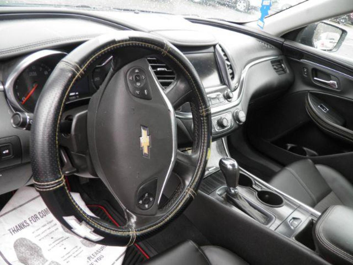 2016 Black Chevrolet Impala LT (2G1115S33G9) with an 3.6L V6 engine, AT transmission, located at 19521 New George's Creek Rd SW, Barton, MD, 21521, (301) 463-2404, 39.524323, -79.017906 - Photo#2