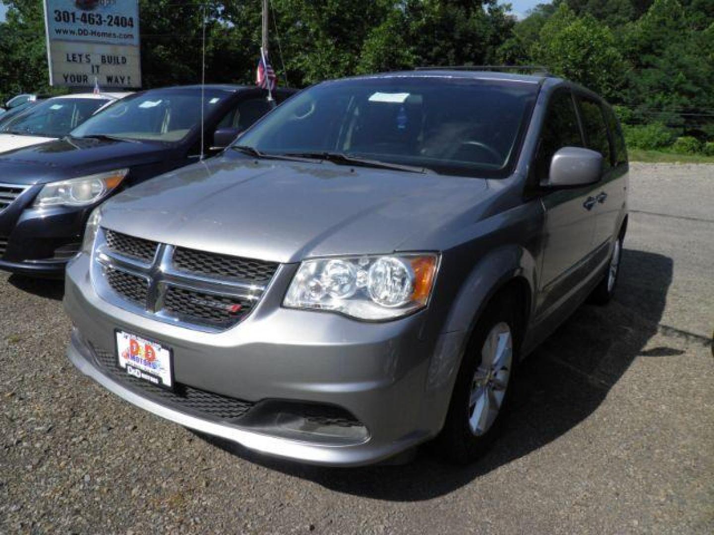 2016 Silver Dodge Grand Caravan SXT (2C4RDGCG3GR) with an 3.6L V6 engine, AT transmission, located at 15520 McMullen Hwy SW, Belair, MD, 21502, (301) 729-3700, 39.581375, -78.846451 - Photo#0