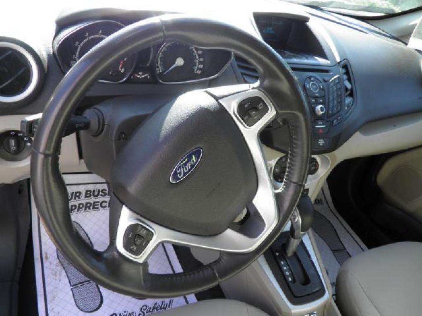 2016 Gray Ford Fiesta SE Hatchback (3FADP4EJXGM) with an 1.6L I4 engine, AT transmission, located at 19521 New George's Creek Rd SW, Barton, MD, 21521, (301) 463-2404, 39.524323, -79.017906 - Photo#2