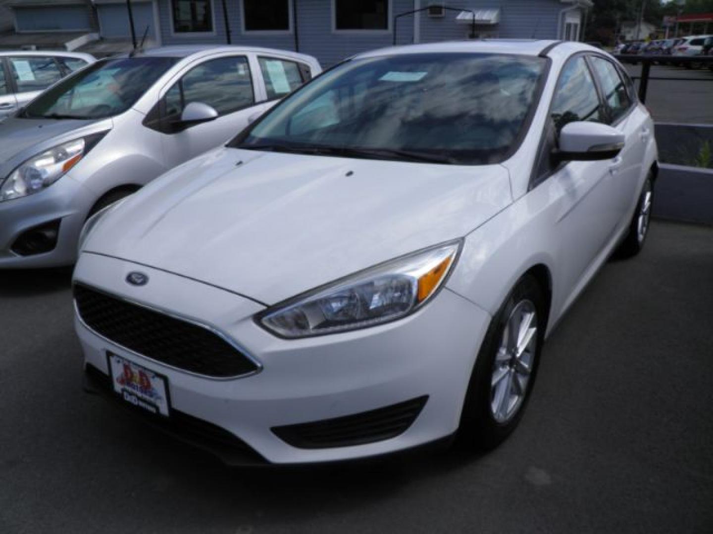 2016 White Ford Focus SE Hatch (1FADP3K25GL) with an 2.0L I4 engine, AT transmission, located at 15520 McMullen Hwy SW, Belair, MD, 21502, (301) 729-3700, 39.581375, -78.846451- Photo#0