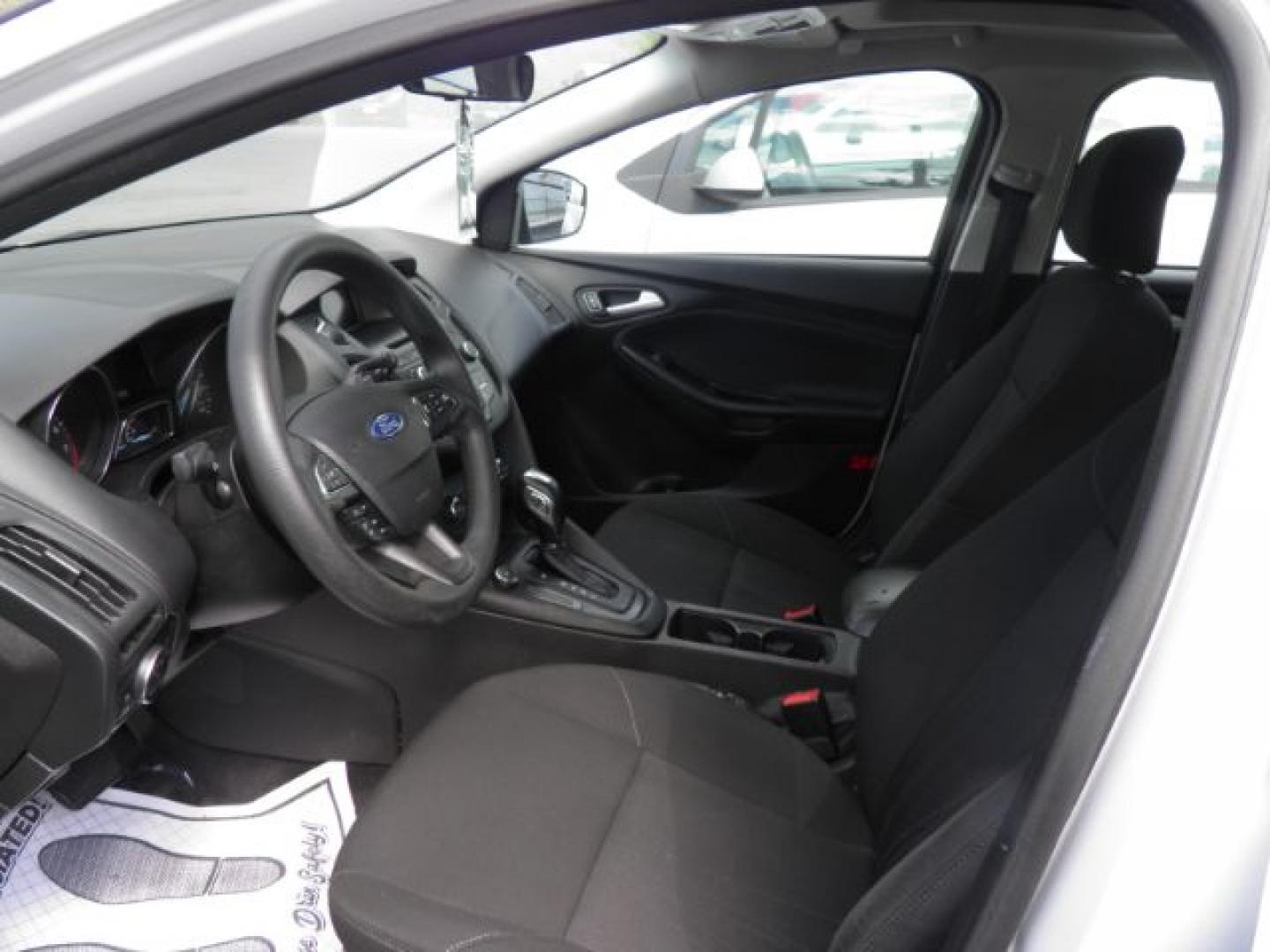 2016 White Ford Focus SE Hatch (1FADP3K25GL) with an 2.0L I4 engine, AT transmission, located at 15520 McMullen Hwy SW, Belair, MD, 21502, (301) 729-3700, 39.581375, -78.846451- Photo#1