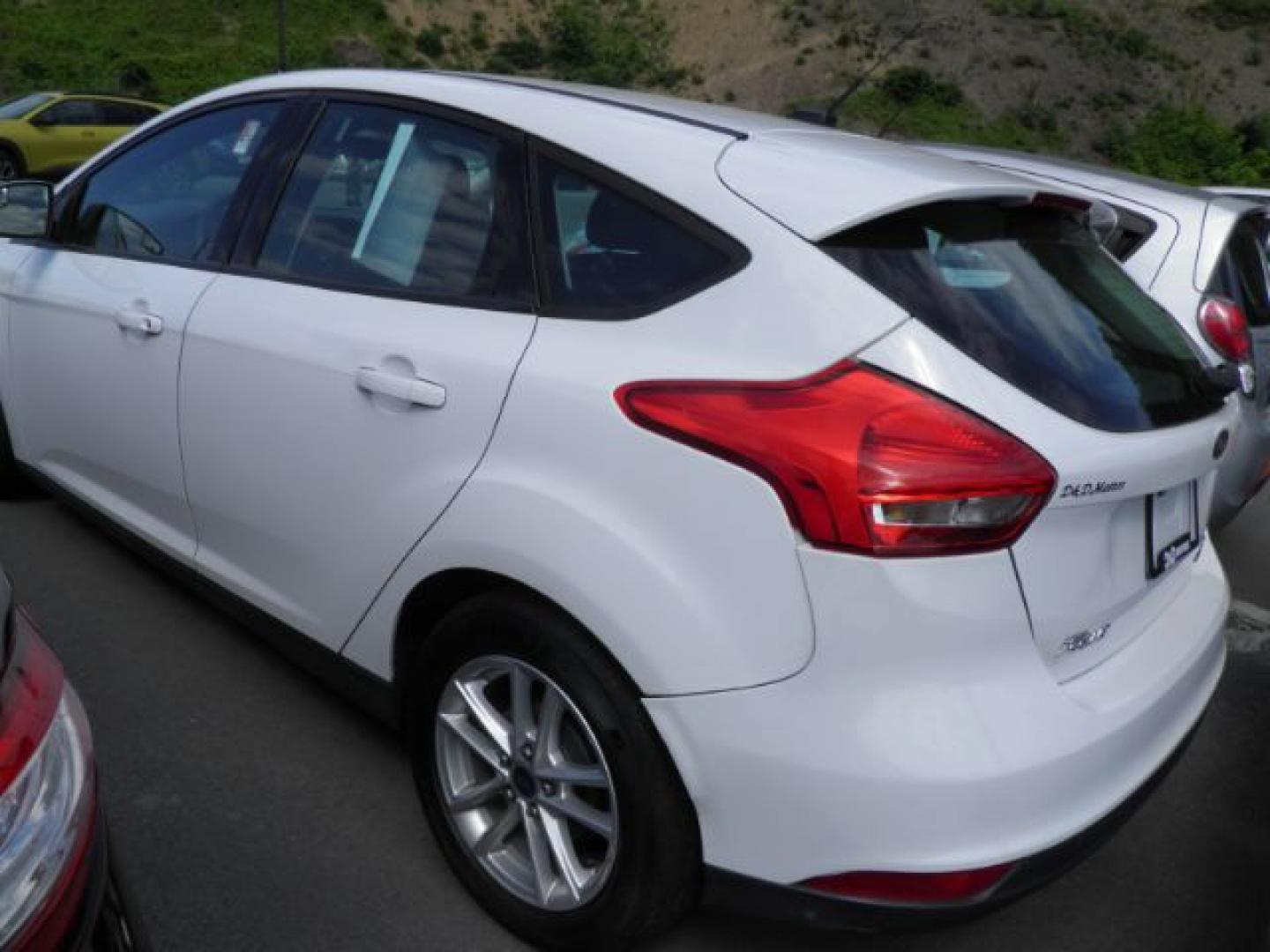 2016 White Ford Focus SE Hatch (1FADP3K25GL) with an 2.0L I4 engine, AT transmission, located at 15520 McMullen Hwy SW, Belair, MD, 21502, (301) 729-3700, 39.581375, -78.846451- Photo#5