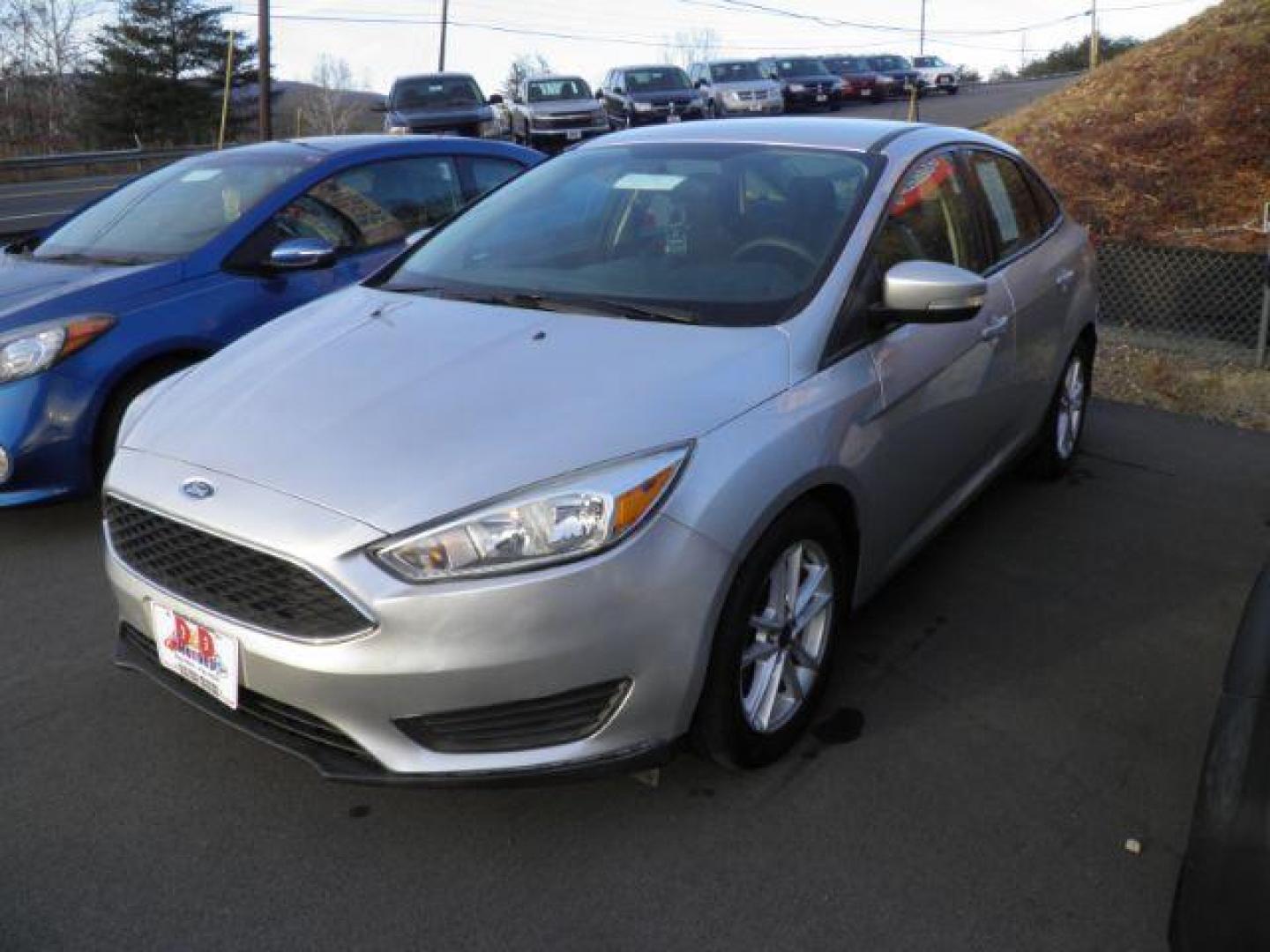 2016 Silver Ford Focus SE Sedan (1FADP3F24GL) with an 2.0L I4 engine, AT transmission, located at 15520 McMullen Hwy SW, Belair, MD, 21502, (301) 729-3700, 39.581375, -78.846451 - Photo#0