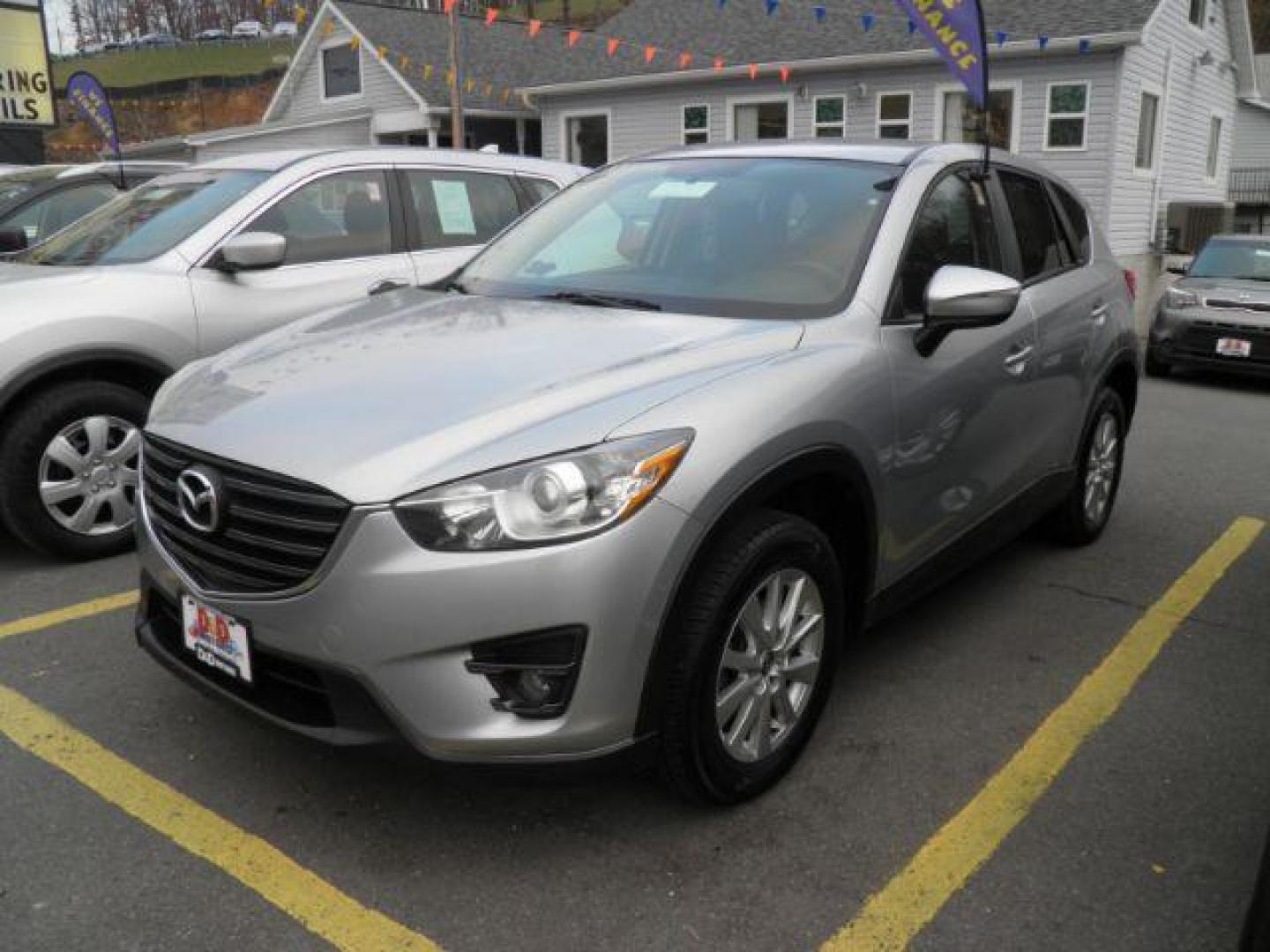 2016 SILVER MAZDA CX-5 Touring AWD (JM3KE4CY7G0) with an 2.5 L4 engine, AT transmission, located at 15520 McMullen Hwy SW, Belair, MD, 21502, (301) 729-3700, 39.581375, -78.846451 - Photo#0