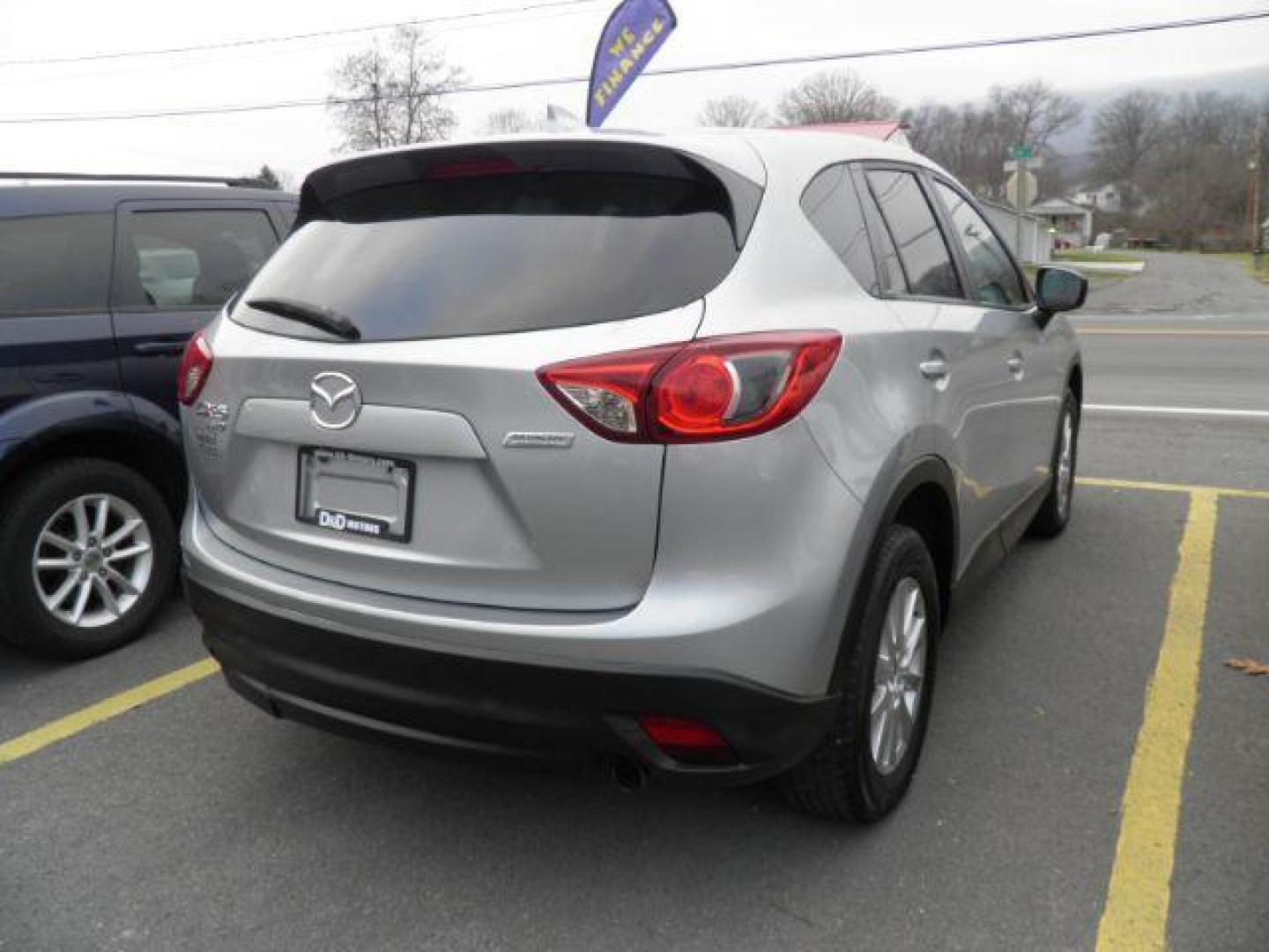 2016 SILVER MAZDA CX-5 Touring AWD (JM3KE4CY7G0) with an 2.5 L4 engine, AT transmission, located at 15520 McMullen Hwy SW, Belair, MD, 21502, (301) 729-3700, 39.581375, -78.846451 - Photo#5