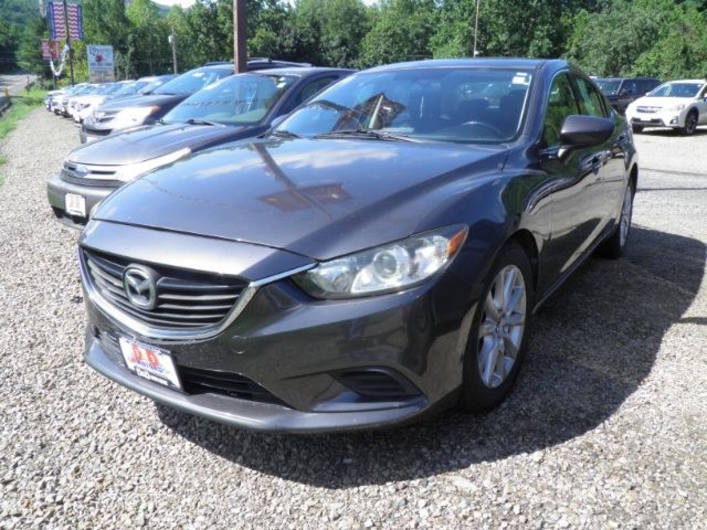 2016 GRAY Mazda Mazda6 i Sport AT (JM1GJ1U57G1) with an 2.5 L4 engine, AT transmission, located at 19521 New George's Creek Rd SW, Barton, MD, 21521, (301) 463-2404, 39.524323, -79.017906- Photo#0