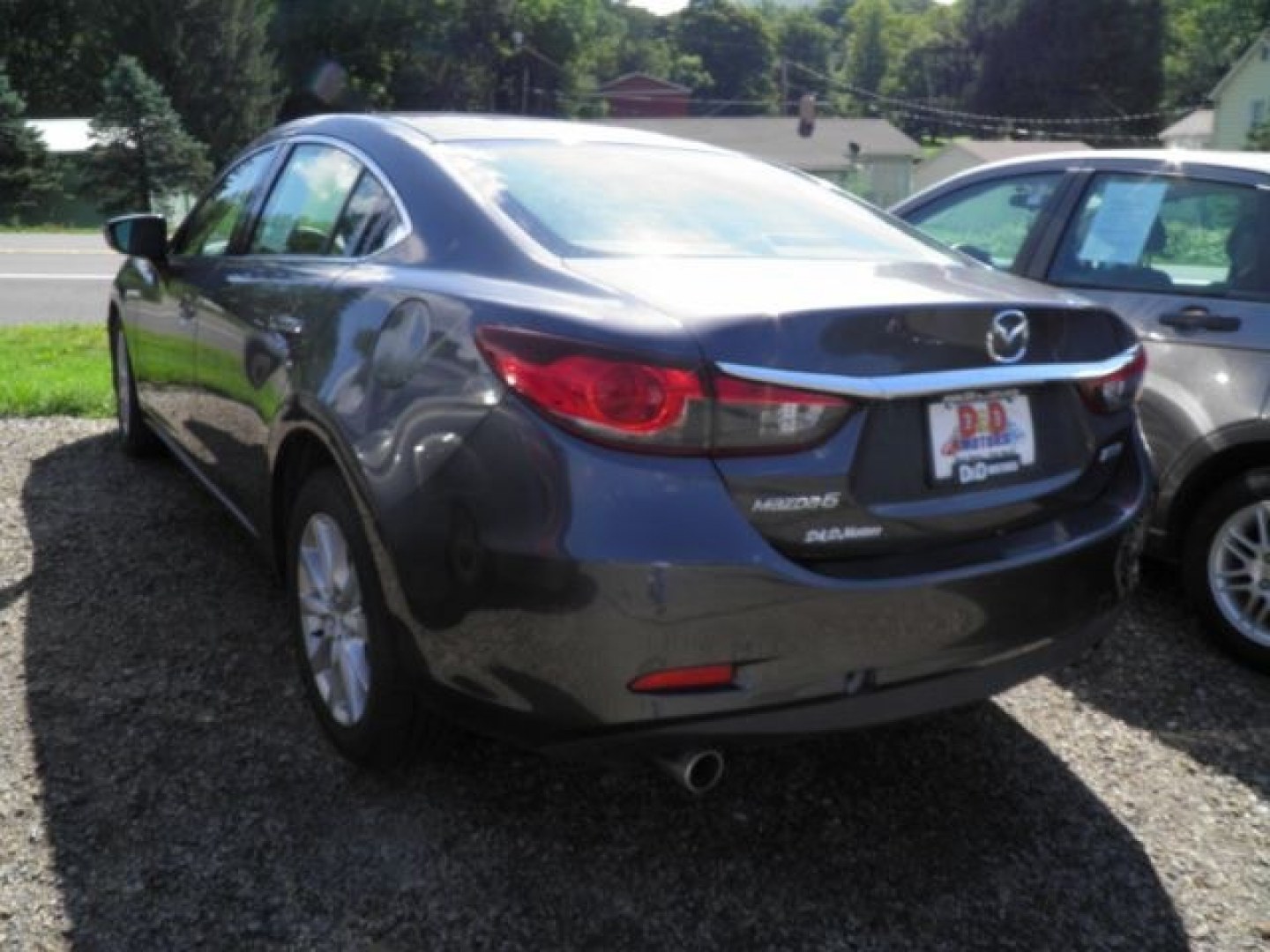 2016 GRAY Mazda Mazda6 i Sport AT (JM1GJ1U57G1) with an 2.5 L4 engine, AT transmission, located at 19521 New George's Creek Rd SW, Barton, MD, 21521, (301) 463-2404, 39.524323, -79.017906- Photo#4