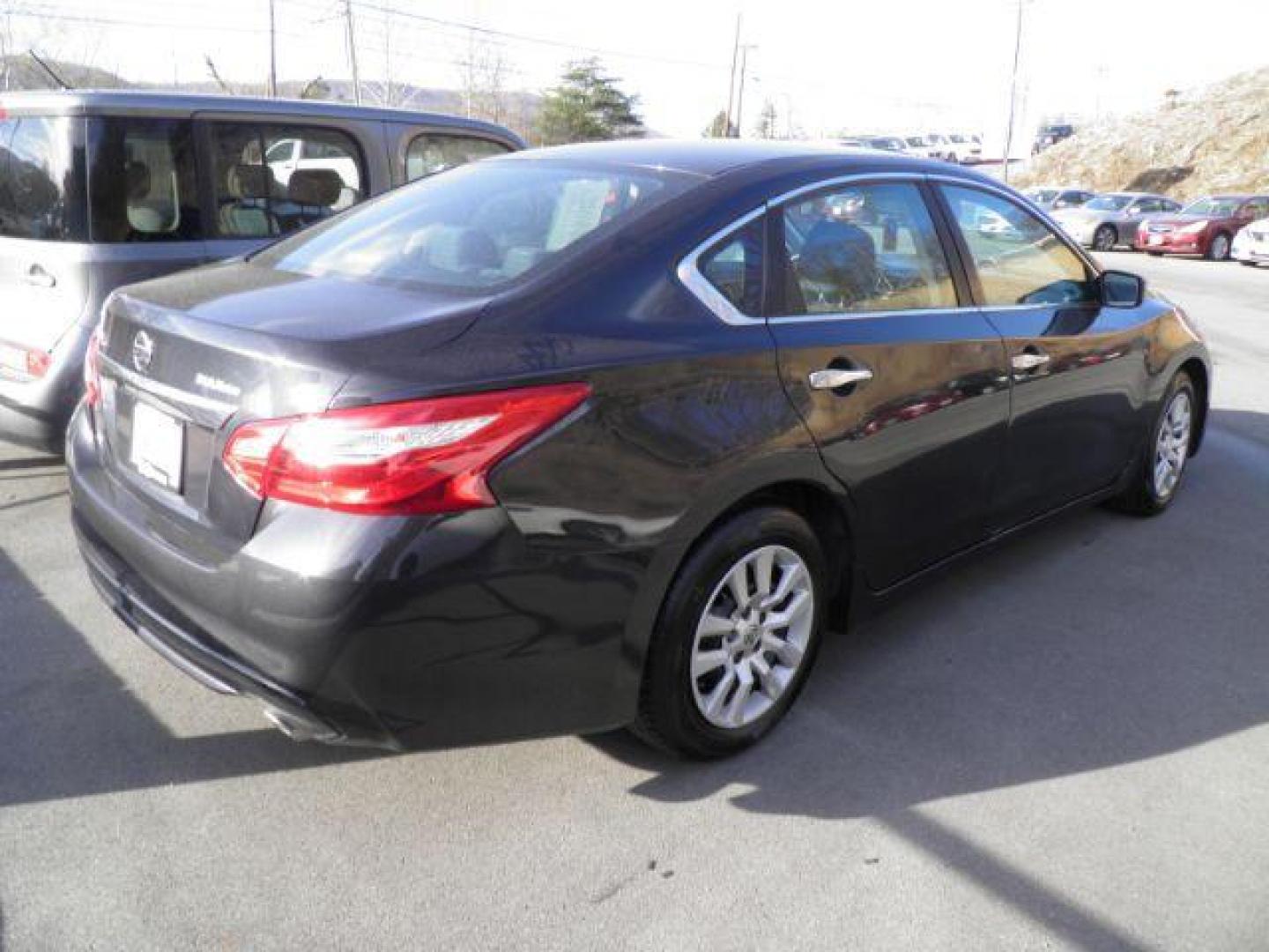 2016 Black Nissan Altima 2.5 S (1N4AL3APXGN) with an 2.5L I4 engine, AT transmission, located at 19521 New George's Creek Rd SW, Barton, MD, 21521, (301) 463-2404, 39.524323, -79.017906 - Photo#3