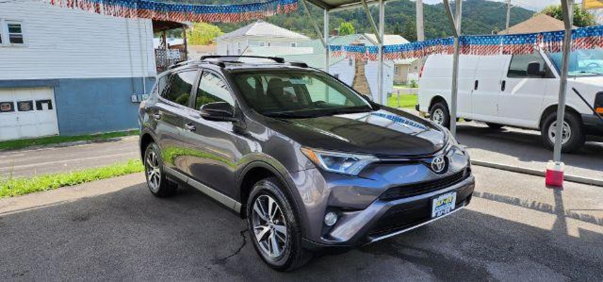 2016 Gray /Black, cloth Toyota RAV4 XLE AWD (JTMRFREV2GJ) with an 2.5L L4 engine, AT transmission, located at 15520 McMullen Hwy SW, Belair, MD, 21502, (301) 729-3700, 39.581375, -78.846451 - Photo#0