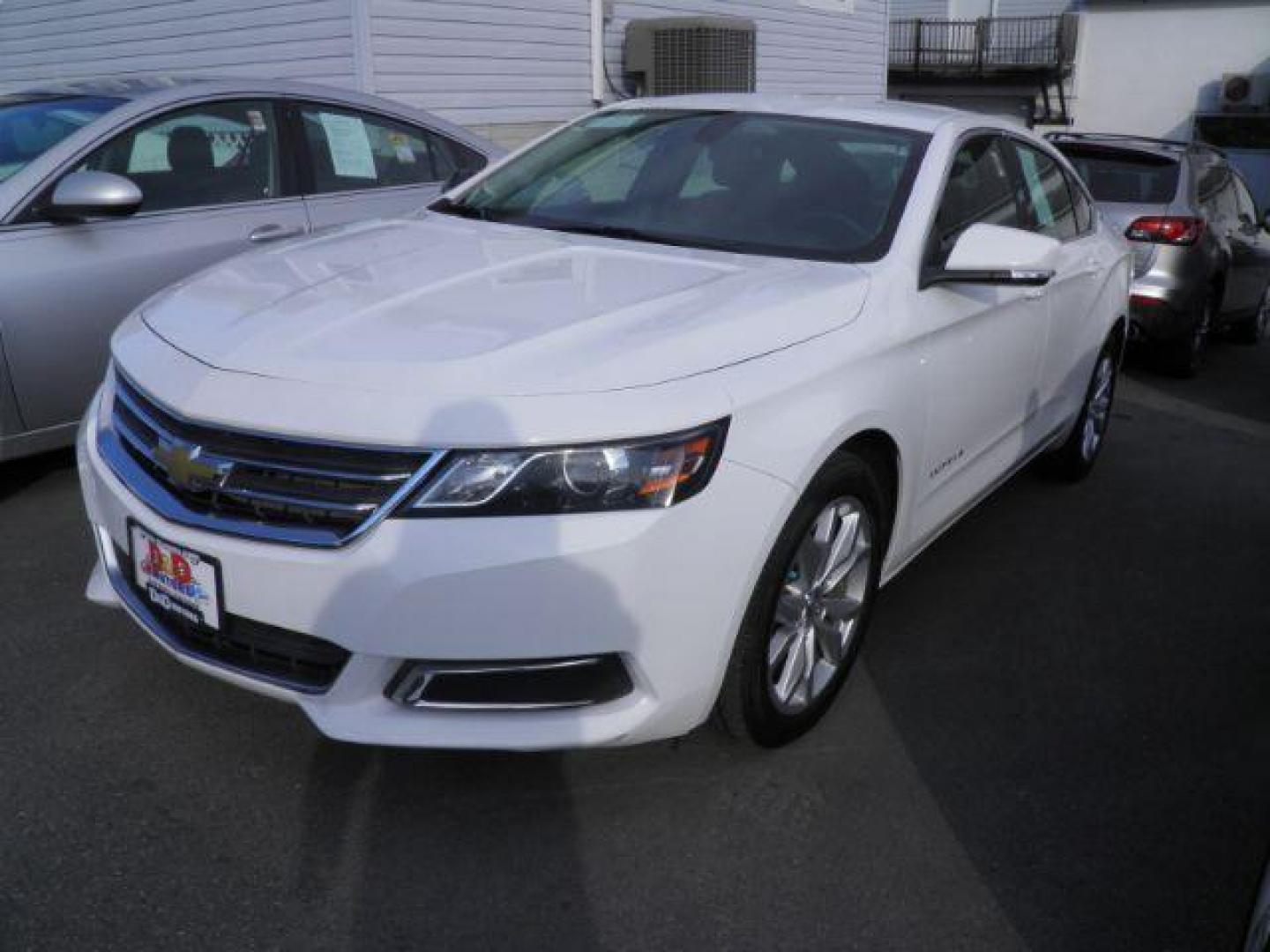 2017 White Chevrolet Impala LT (2G1105S31H9) with an 3.6L V6 engine, AT transmission, located at 15520 McMullen Hwy SW, Belair, MD, 21502, (301) 729-3700, 39.581375, -78.846451 - Photo#0