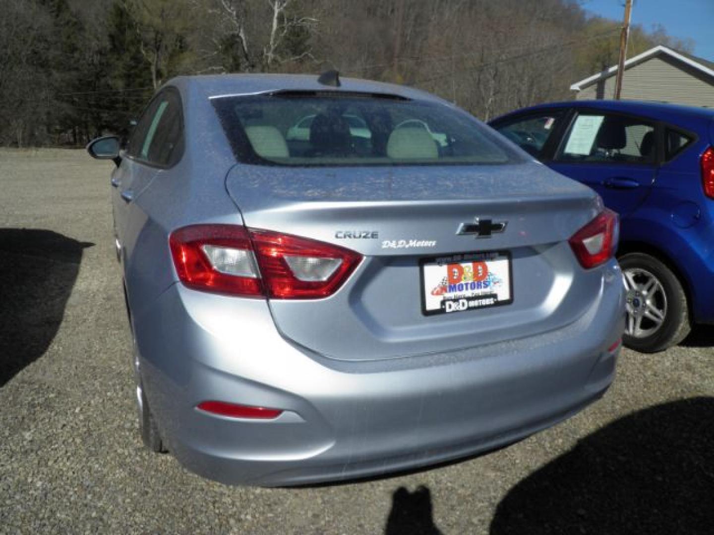 2018 Silver Chevrolet Cruze LS Auto (1G1BC5SM9J7) with an 1.4L I4 engine, AT transmission, located at 19521 New George's Creek Rd SW, Barton, MD, 21521, (301) 463-2404, 39.524323, -79.017906- Photo#4