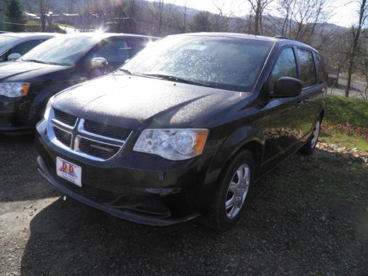 2018 Black Dodge Grand Caravan SE (2C4RDGBG7JR) with an 3.6L V6 engine, AT transmission, located at 15520 McMullen Hwy SW, Belair, MD, 21502, (301) 729-3700, 39.581375, -78.846451 - Photo#0