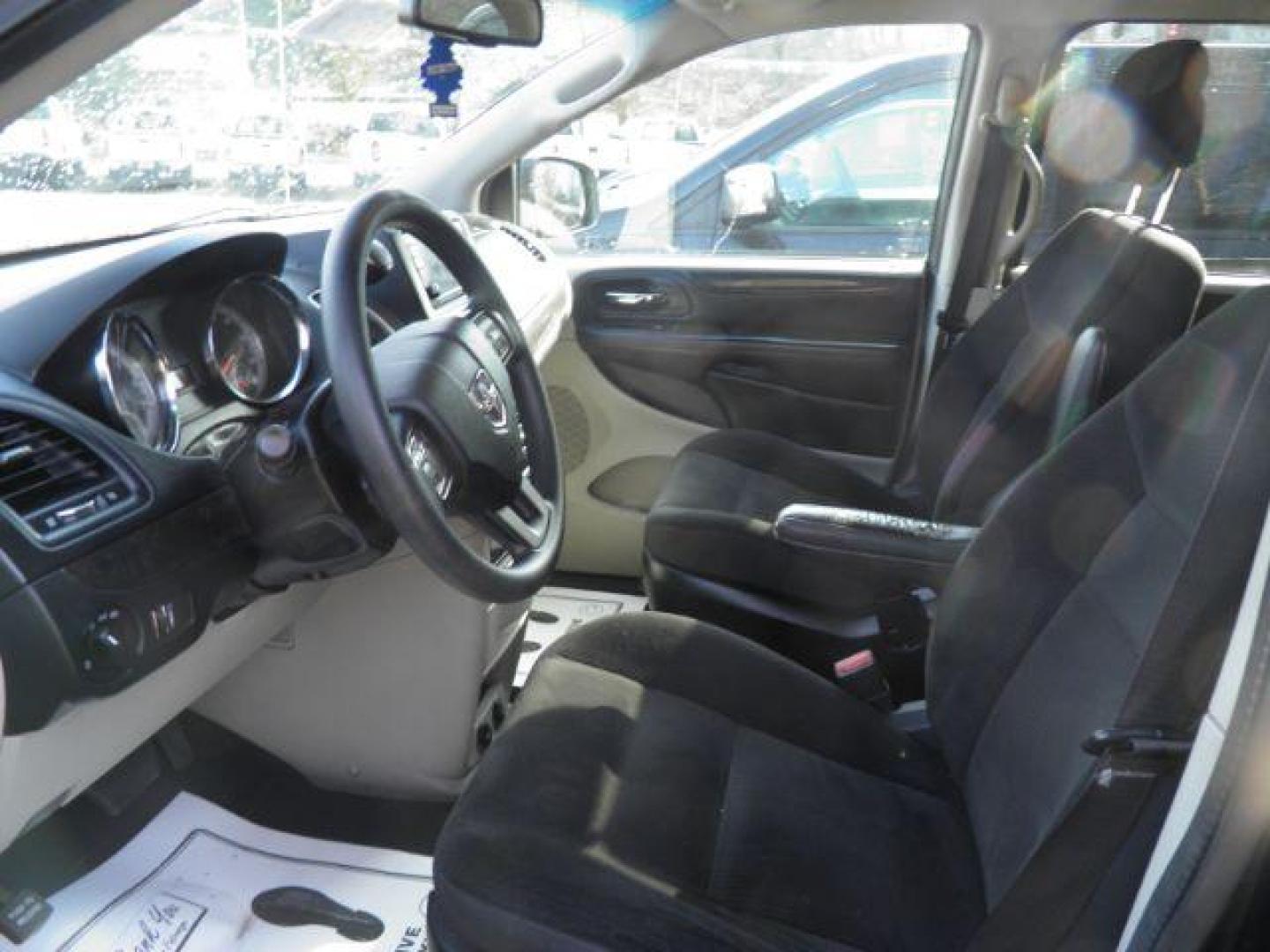 2018 Black Dodge Grand Caravan SE (2C4RDGBG7JR) with an 3.6L V6 engine, AT transmission, located at 15520 McMullen Hwy SW, Belair, MD, 21502, (301) 729-3700, 39.581375, -78.846451 - Photo#1