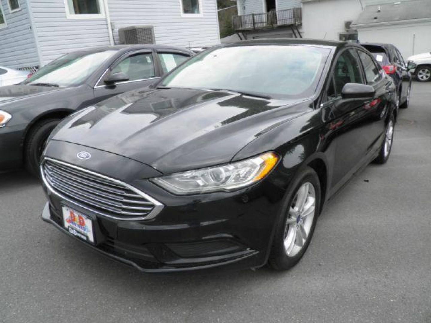 2018 Black /Black Cloth Ford Fusion SE (3FA6P0H77JR) with an 2.5L L4 DOHC 16V engine, AT transmission, located at 15520 McMullen Hwy SW, Belair, MD, 21502, (301) 729-3700, 39.581375, -78.846451- Photo#0