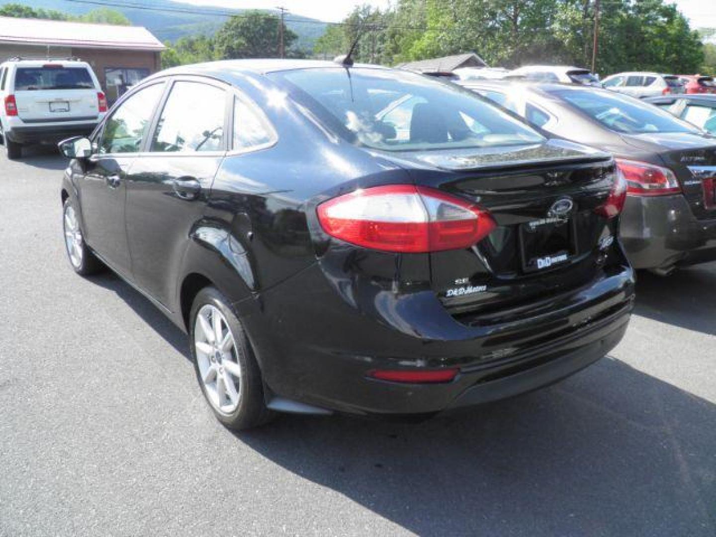 2019 Black Ford Fiesta SE Sedan (3FADP4BJ1KM) with an 1.6L I4 engine, AT transmission, located at 15520 McMullen Hwy SW, Belair, MD, 21502, (301) 729-3700, 39.581375, -78.846451 - Photo#4