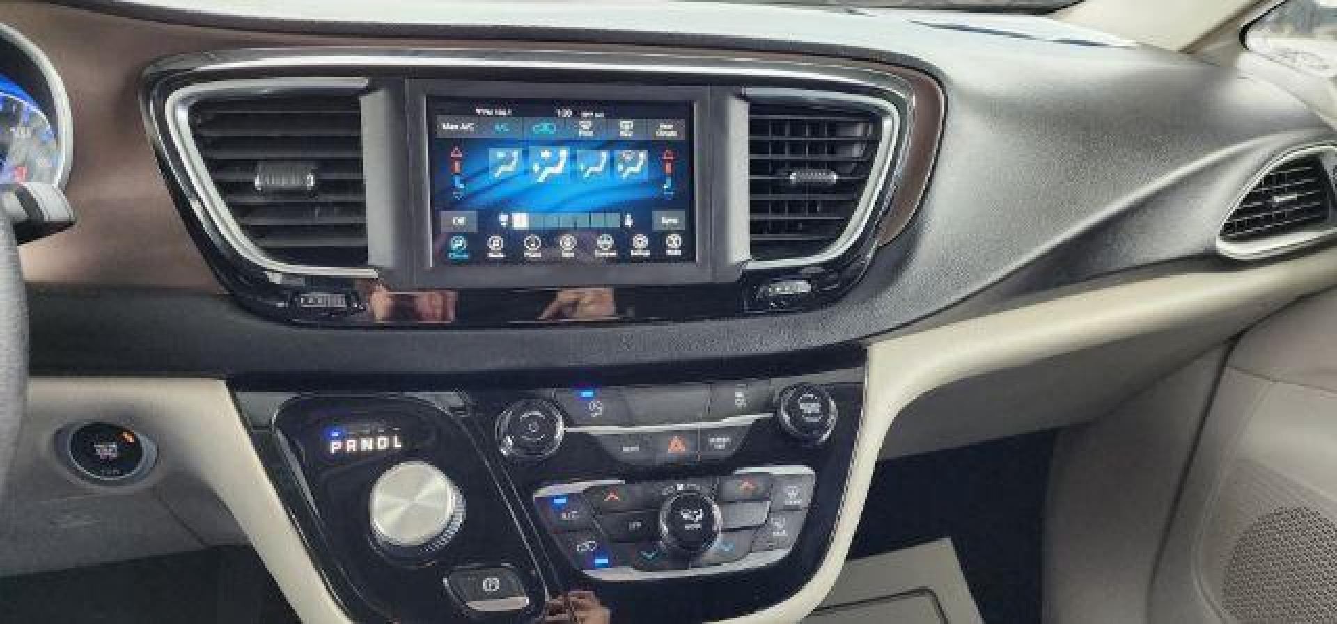 2020 Gray /Alloy/Black Chrysler Voyager LXI (2C4RC1DG9LR) with an 3.6L V6 engine, AT transmission, located at 15520 McMullen Hwy SW, Belair, MD, 21502, (301) 729-3700, 39.581375, -78.846451 - Photo#4