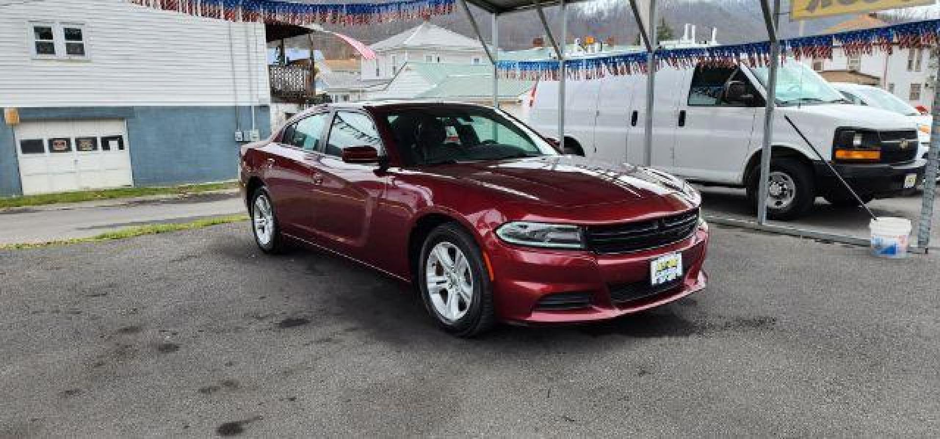 2021 Maroon /Black, premium leather Dodge Charger SXT (2C3CDXBG4MH) with an 3.6L V6 engine, AT transmission, located at 15520 McMullen Hwy SW, Belair, MD, 21502, (301) 729-3700, 39.581375, -78.846451 - Photo#0