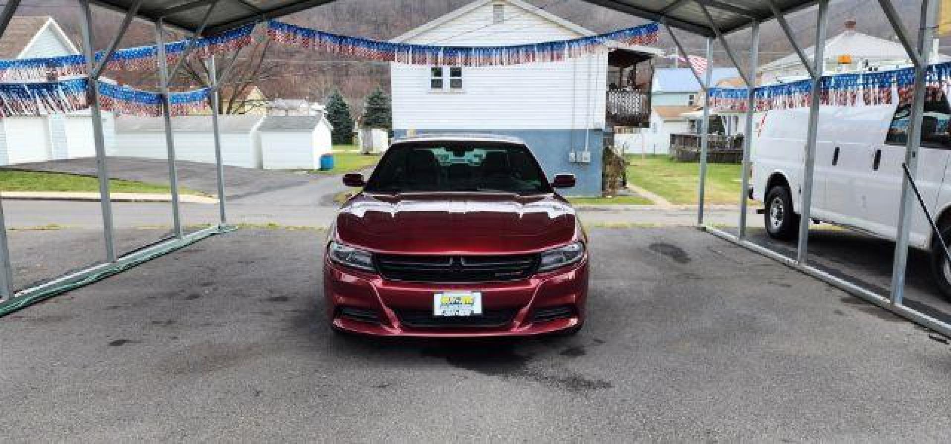 2021 Maroon /Black, premium leather Dodge Charger SXT (2C3CDXBG4MH) with an 3.6L V6 engine, AT transmission, located at 15520 McMullen Hwy SW, Belair, MD, 21502, (301) 729-3700, 39.581375, -78.846451 - Photo#1