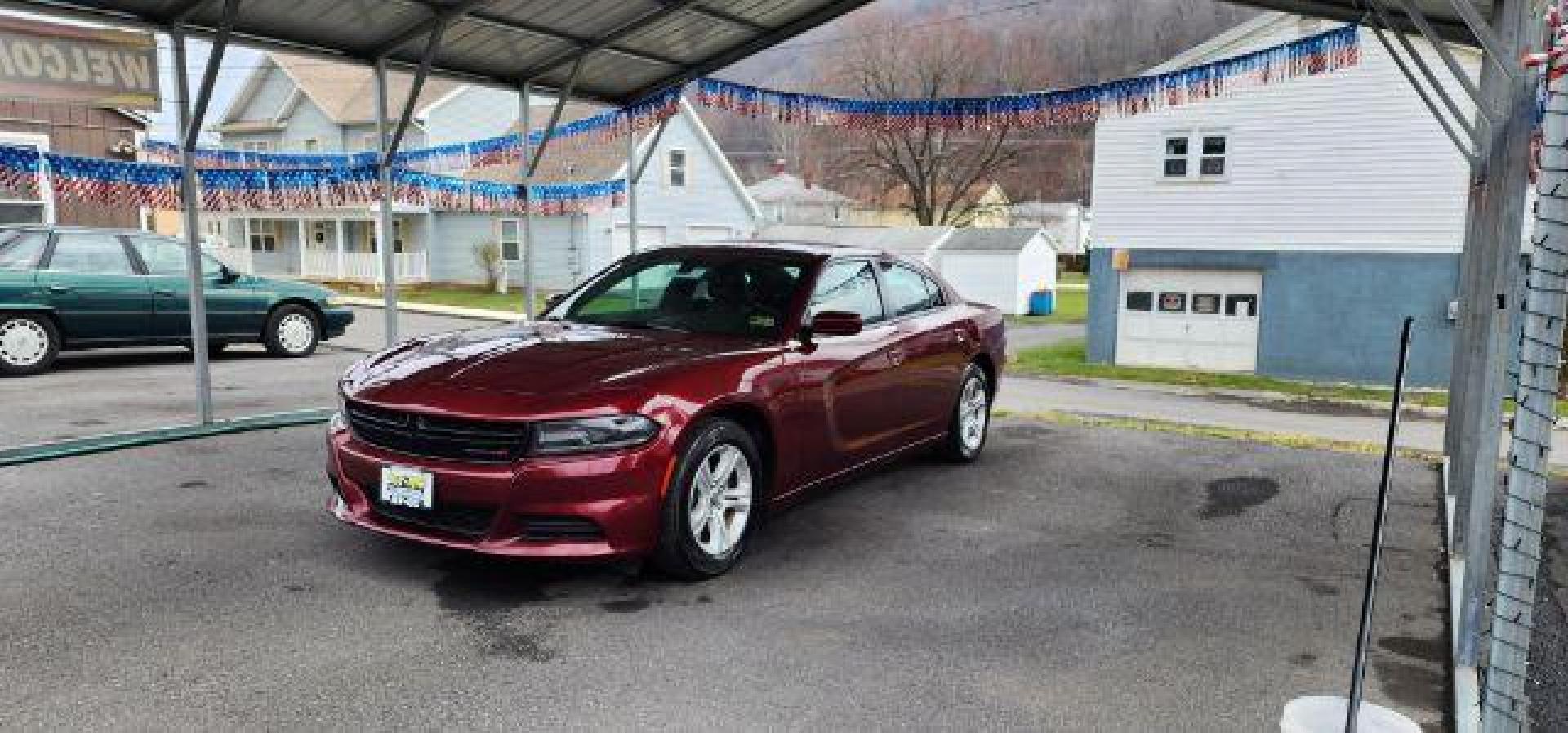 2021 Maroon /Black, premium leather Dodge Charger SXT (2C3CDXBG4MH) with an 3.6L V6 engine, AT transmission, located at 15520 McMullen Hwy SW, Belair, MD, 21502, (301) 729-3700, 39.581375, -78.846451 - Photo#2