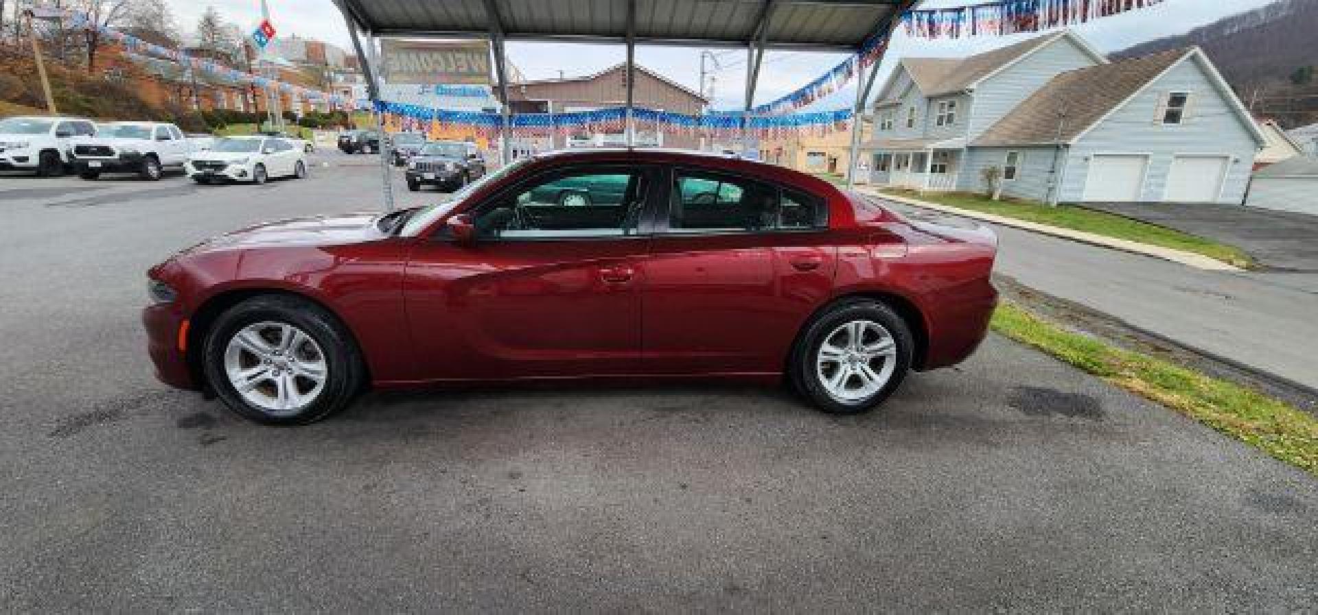 2021 Maroon /Black, premium leather Dodge Charger SXT (2C3CDXBG4MH) with an 3.6L V6 engine, AT transmission, located at 15520 McMullen Hwy SW, Belair, MD, 21502, (301) 729-3700, 39.581375, -78.846451 - Photo#3