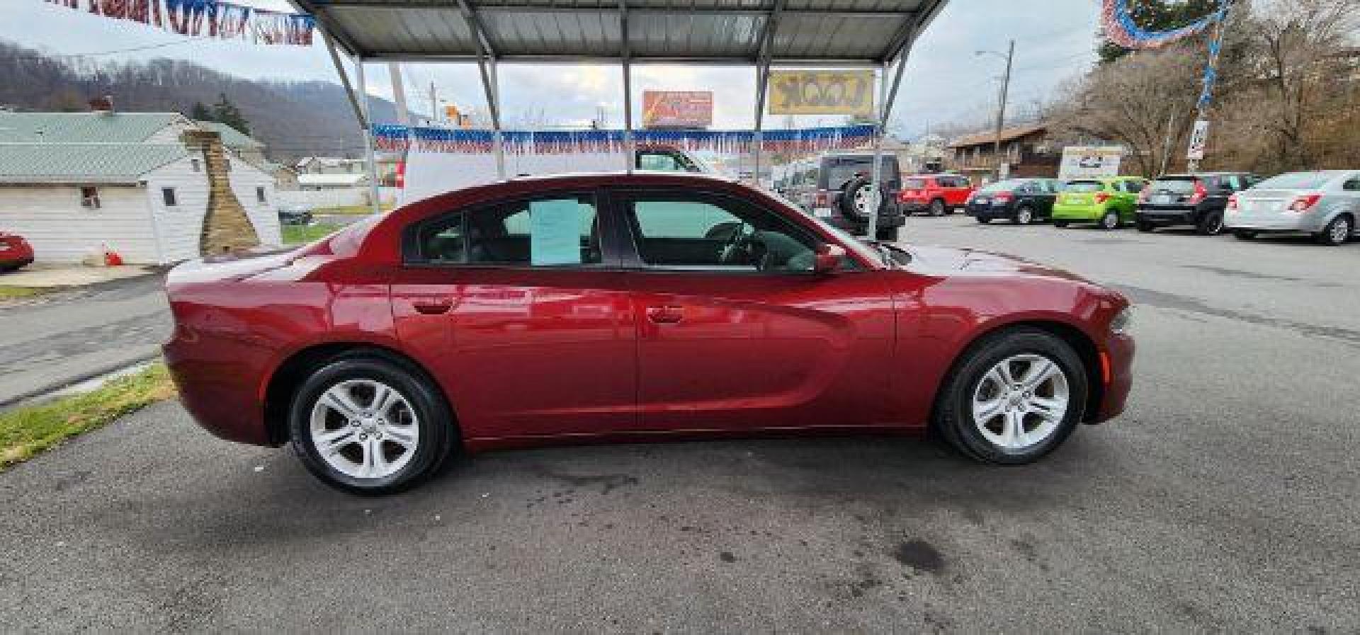 2021 Maroon /Black, premium leather Dodge Charger SXT (2C3CDXBG4MH) with an 3.6L V6 engine, AT transmission, located at 15520 McMullen Hwy SW, Belair, MD, 21502, (301) 729-3700, 39.581375, -78.846451 - Photo#13